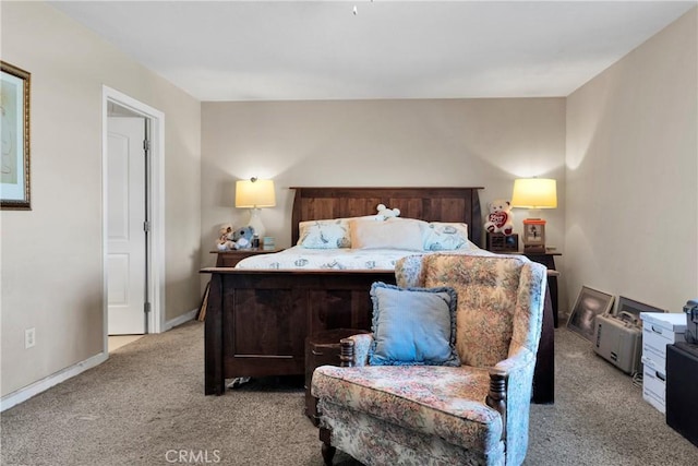 bedroom featuring light colored carpet