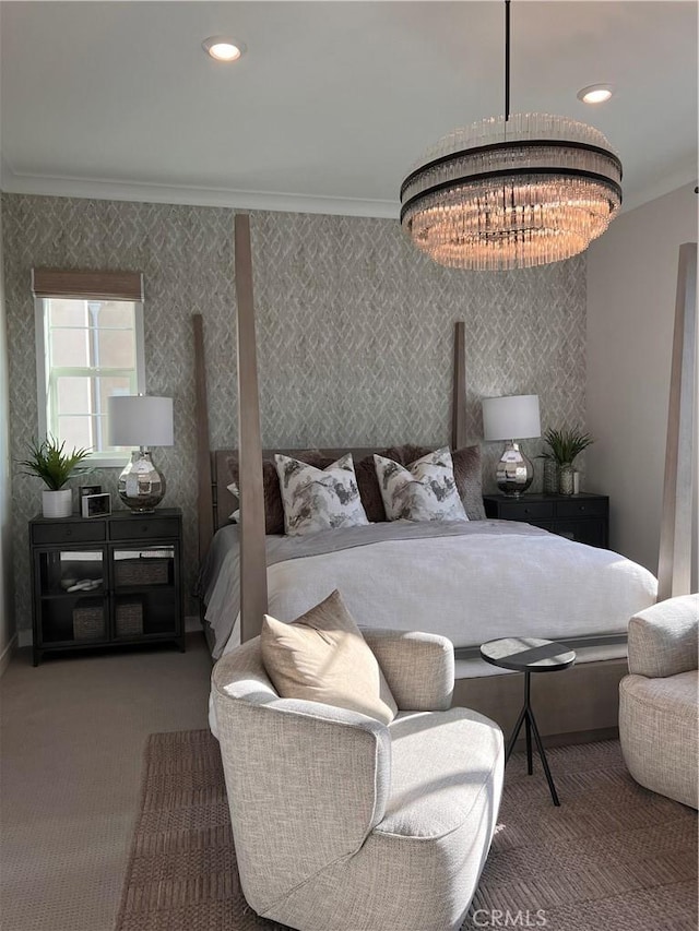 bedroom with carpet, ornamental molding, and a notable chandelier