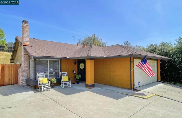 single story home with a garage