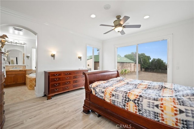 bedroom with visible vents, arched walkways, access to exterior, crown molding, and light wood-style floors