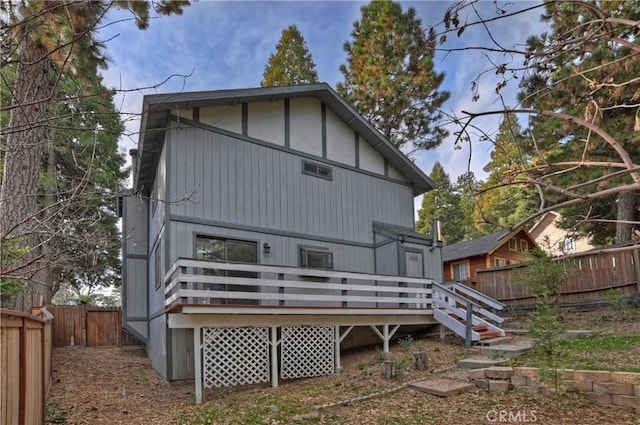 rear view of house with a deck