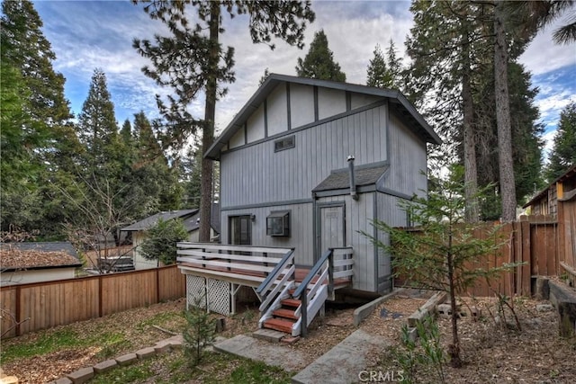 rear view of house with a deck