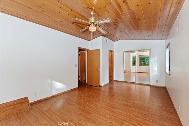 unfurnished room featuring wooden ceiling, hardwood / wood-style flooring, vaulted ceiling, and ceiling fan