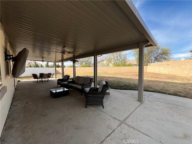 view of patio featuring ceiling fan and outdoor lounge area