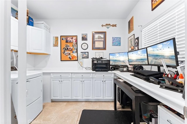 kitchen featuring light tile patterned floors and white cabinetry