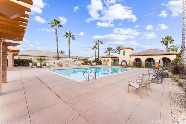 view of pool featuring a patio area