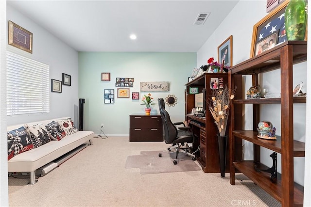 office area featuring light colored carpet