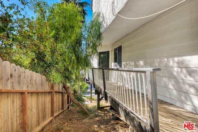 view of yard featuring a wooden deck