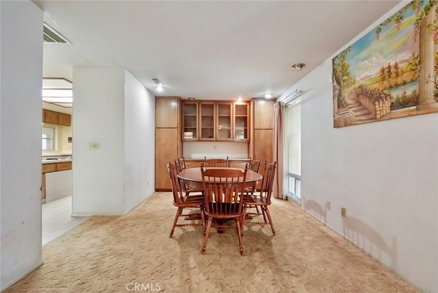 view of carpeted dining room