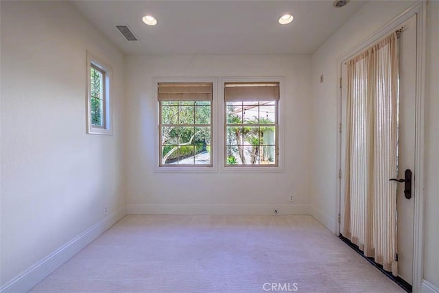 view of carpeted spare room