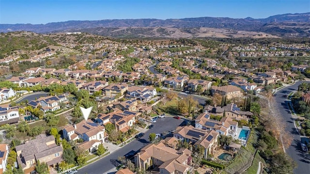 drone / aerial view featuring a mountain view