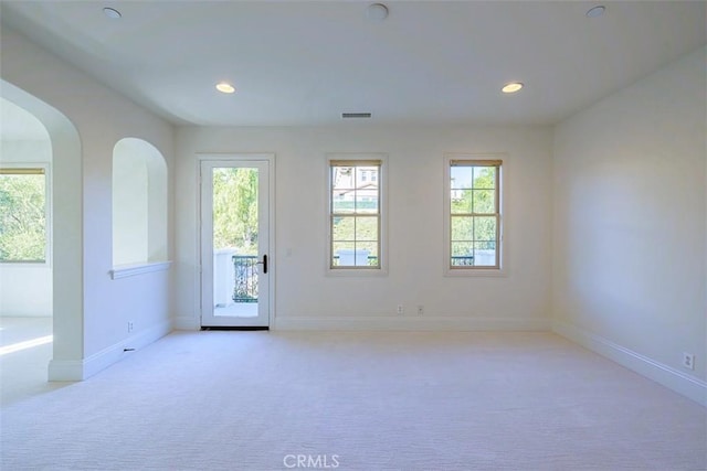 view of carpeted spare room