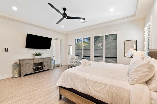 bedroom with ceiling fan and light wood-type flooring