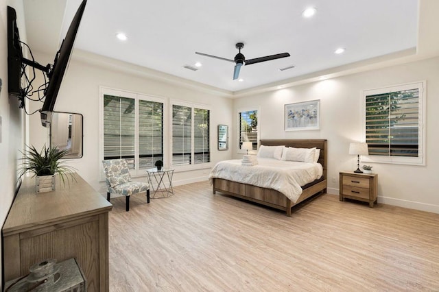 bedroom featuring ceiling fan and light hardwood / wood-style floors