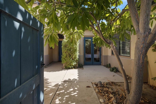 entrance to property featuring french doors