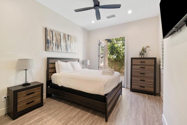 bedroom featuring ceiling fan and light hardwood / wood-style flooring