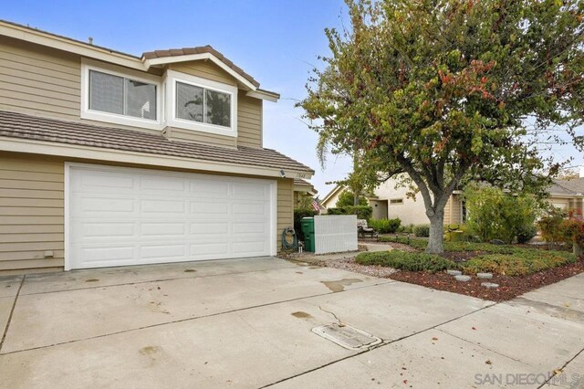 exterior space with a garage