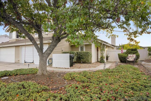 view of property exterior featuring a garage