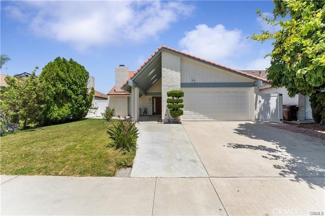 view of front facade with a front lawn and a garage