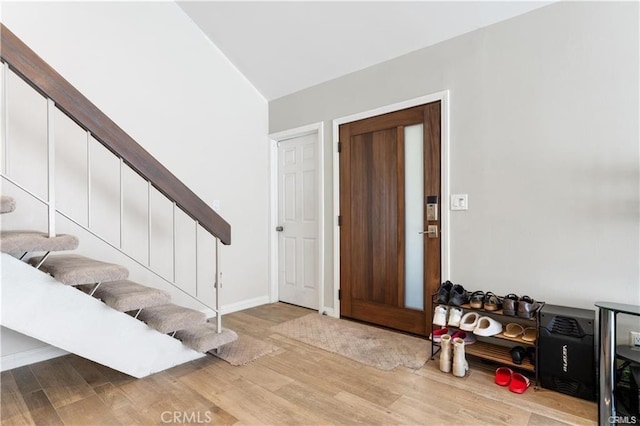 foyer with light hardwood / wood-style floors