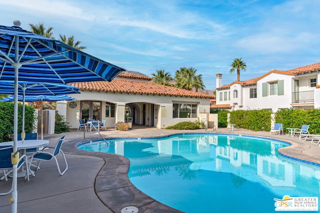 view of pool with a patio area