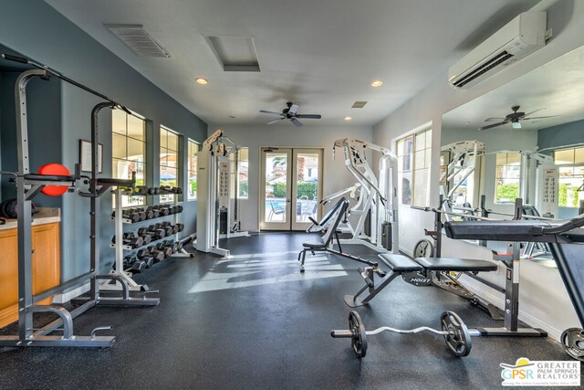 exercise room featuring ceiling fan and an AC wall unit