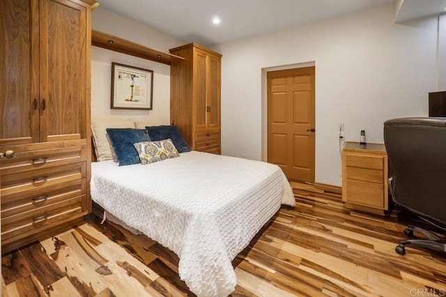 bedroom with wood-type flooring