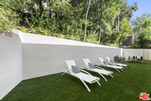 view of yard with an outdoor hangout area