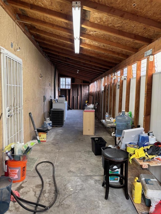 miscellaneous room with concrete flooring