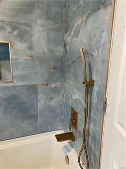 bathroom with walk in shower