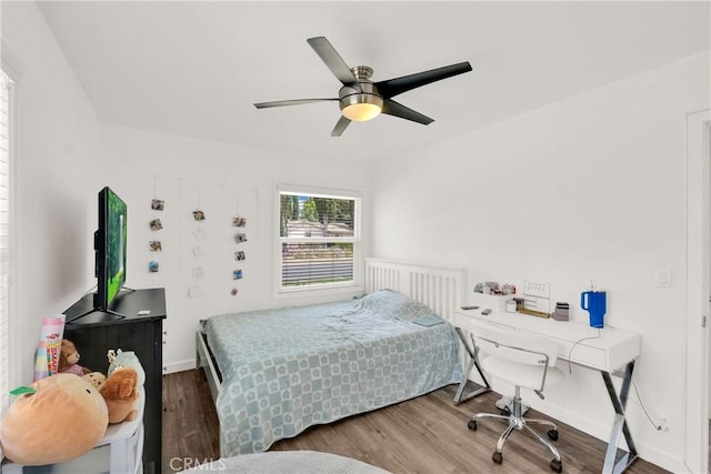 bedroom featuring ceiling fan and hardwood / wood-style floors