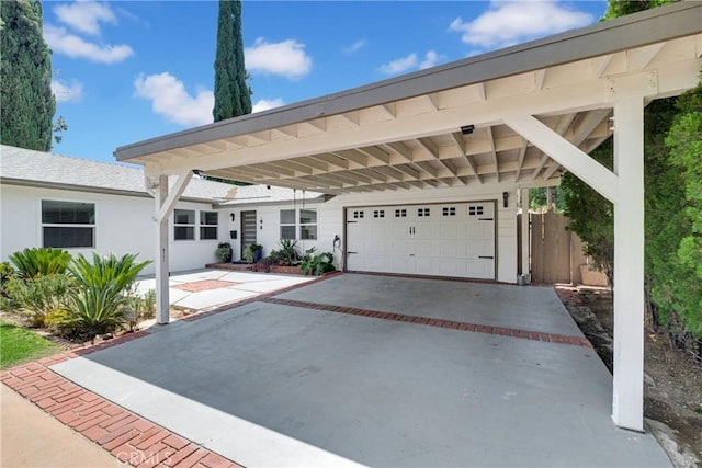 view of front of home with a carport