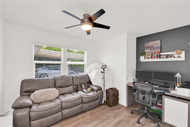 office featuring ceiling fan and light hardwood / wood-style floors