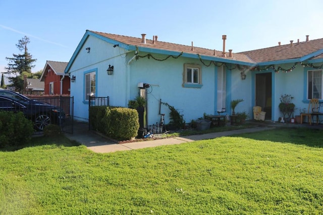 view of home's exterior featuring a yard