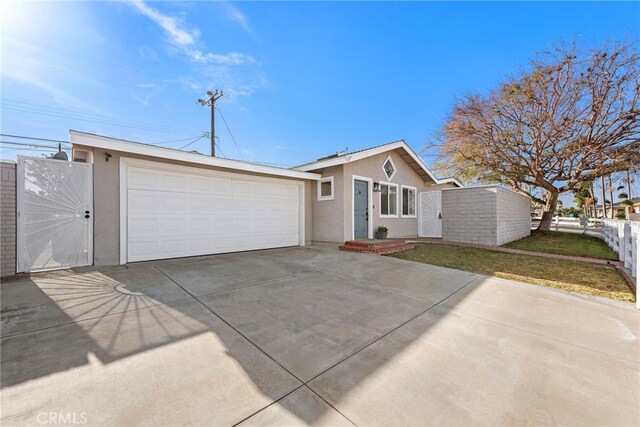 single story home featuring a garage