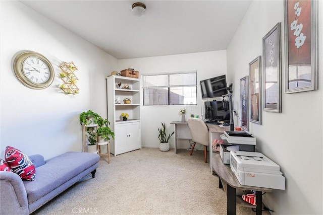 office area featuring light colored carpet