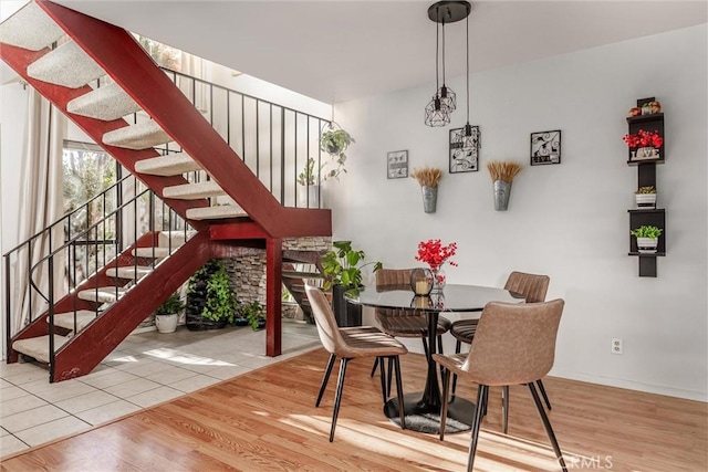 dining area featuring light wood-type flooring