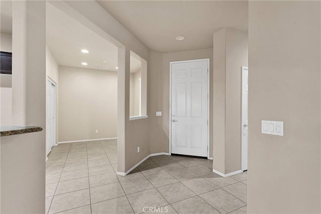 interior space featuring light tile patterned floors