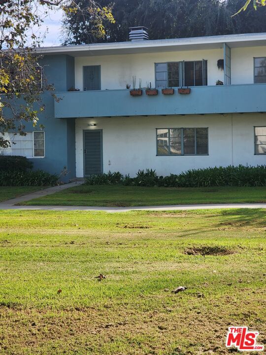 view of property with a front yard