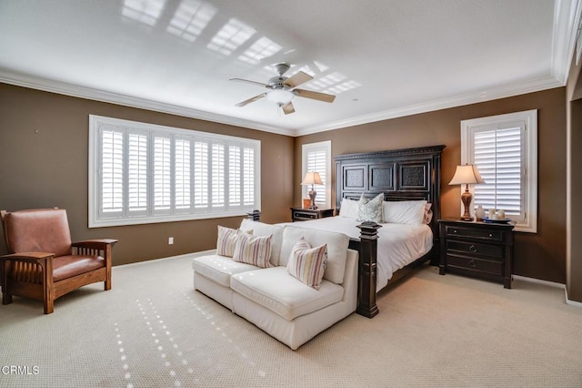 bedroom with ceiling fan, crown molding, and light carpet