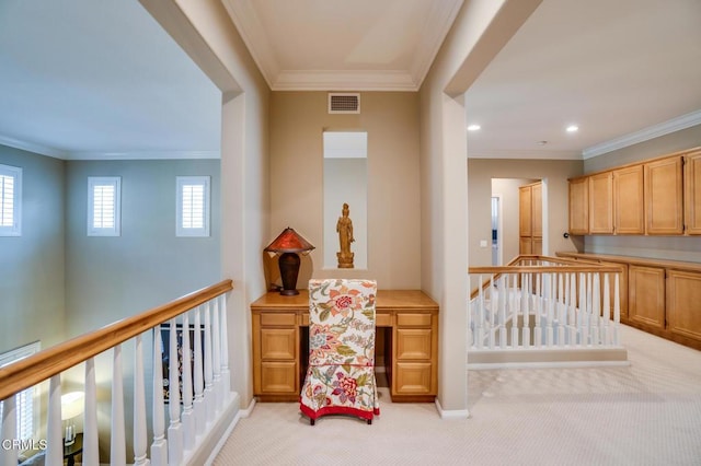 hallway featuring light colored carpet and crown molding