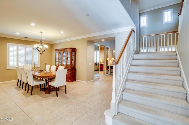 tiled dining space with crown molding and an inviting chandelier