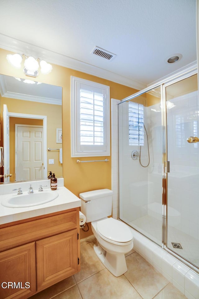 bathroom with toilet, walk in shower, ornamental molding, and tile patterned flooring