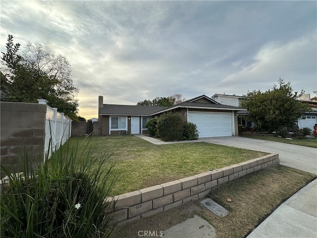 single story home featuring a front lawn and a garage