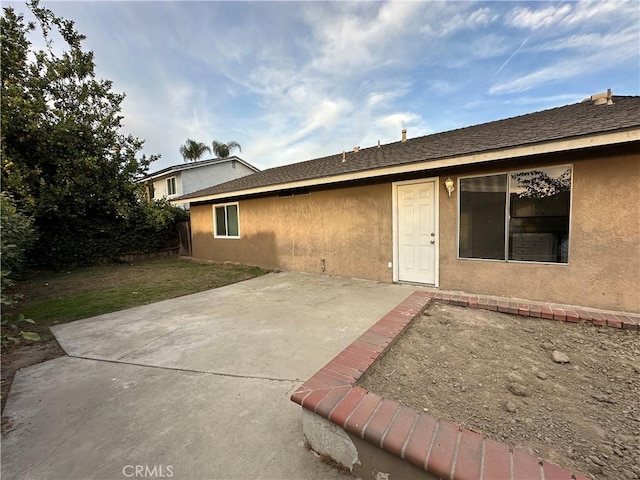 rear view of house with a patio area