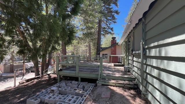 view of yard with a wooden deck