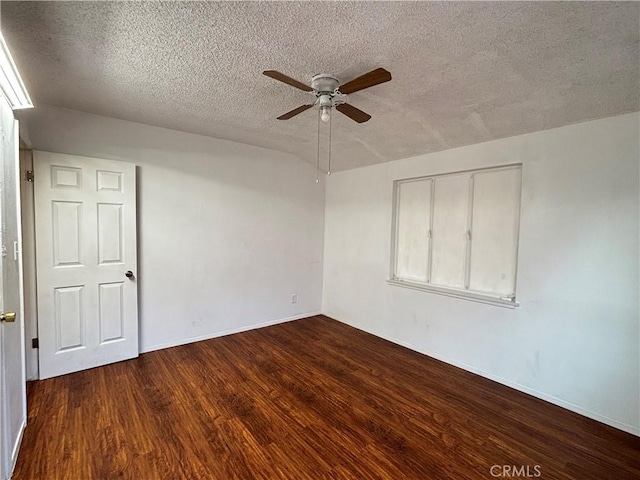 unfurnished room featuring ceiling fan, a textured ceiling, and hardwood / wood-style flooring