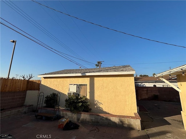 view of home's exterior with a patio area