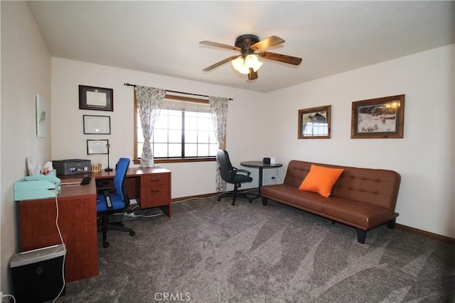 carpeted office space with ceiling fan