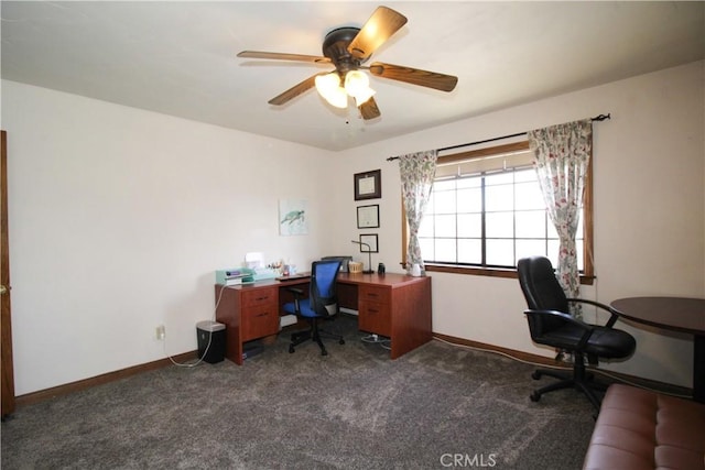 carpeted office space with ceiling fan